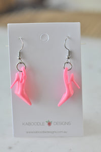 Pair of hot pink stiletto heel drop earrings on a Kaboodle Designs card