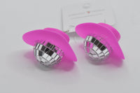 Angled close-up showing pink hat brim and mirrored disco ball detail on both earrings