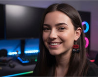 Woman wearing a single black and red Game Over controller drop earring