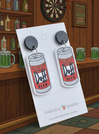 Angled view of Duff Beer novelty drop earrings showing red and grey can design