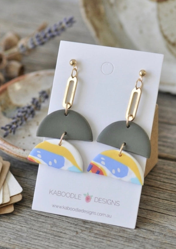 Sage green and abstract print clay drop earrings on Kaboodle Designs card with gold-tone chain link