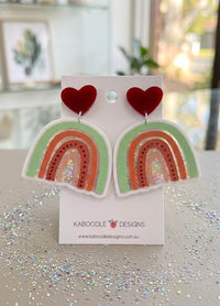 Rainbow shaker drop earrings with red heart top on Kaboodle Designs card