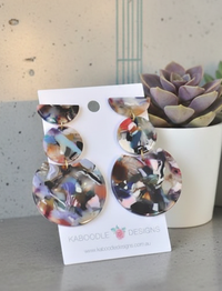 Terrazzo confetti acrylic drop earrings on Kaboodle Designs card, shown beside a succulent plant