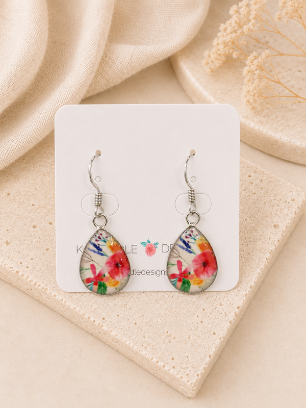 Teardrop floral earrings on Kaboodle card showing printed poppy and lavender bouquet design