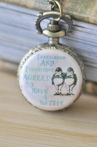 Antique bronze pocket watch necklace with Tweedledum and Tweedledee illustration and text