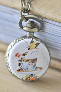 Antique bronze pocket watch necklace with painted tea cup and bird design pendant