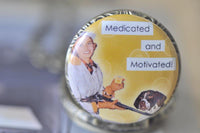 Close-up of pocket watch pendant featuring retro pin up girl, dog, and cheeky slogan design