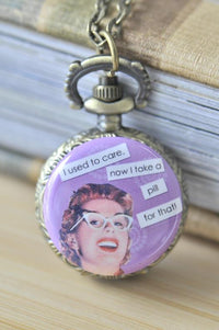 Retro pin up girl pocket watch necklace with sassy quote on purple background
