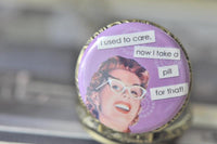 Close-up of retro pin up girl pocket watch pendant with cheeky quote design