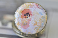 Detailed view of watercolour flower artwork on antique bronze pocket watch pendant