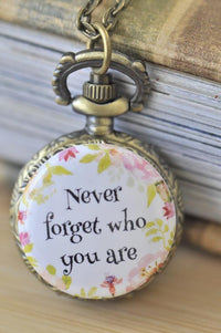 Antique brass pocket watch necklace with floral design and Never forget who you are quote