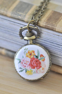 Antique bronze pocket watch necklace with a watercolour floral bouquet on the lid
