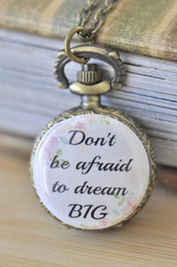 Antique bronze pocket watch necklace with floral "Don't Be Afraid To Dream Big" quote pendant