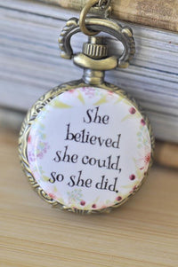 Antique bronze pocket watch necklace with floral quote "She believed she could, so she did"
