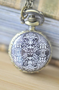 Black and white damask floral pocket watch necklace pendant close up