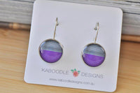 Round dangle earrings with grey stripes and purple half-moon design, on Kaboodle card