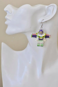 Single space ranger earring shown on ear mannequin for scale