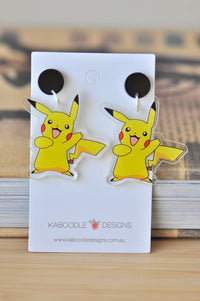 Pair of yellow cartoon mouse acrylic drop earrings on white display card with black studs