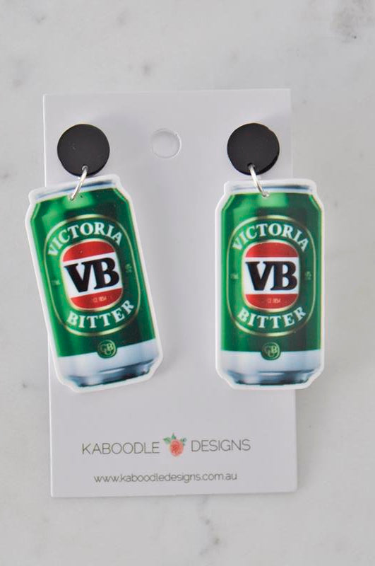 Pair of VB beer can dangle earrings with black round studs displayed on a white card