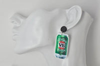 VB beer can earring worn on a mannequin ear showing the dangle drop style