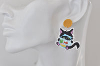 Goldfish bowl kitten earring with orange fish and green pondweed shown worn on ear