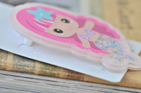 Side angle of mermaid brooch showing acrylic thickness and pin attachment