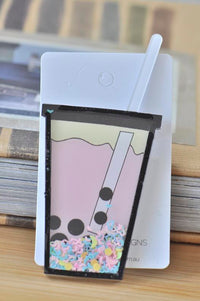 Acrylic bubble tea brooch shaped like a takeaway cup with straw, pearls and pastel sprinkles