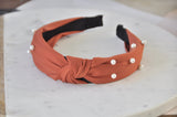 Fabric Knotted Headband - Burnt Orange with Faux Pearl