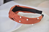Fabric Knotted Headband - Burnt Orange with Faux Pearl