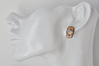 Enamel Kevin face stud earring worn on ear for scale, shown against white mannequin head