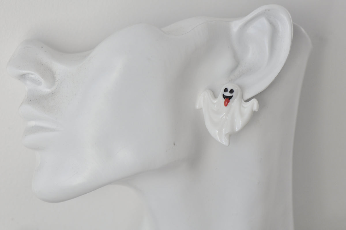 White ghost stud earring worn on a model's ear showing its size on the earlobe