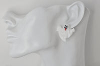 White ghost stud earring worn on a model's ear showing its size on the earlobe