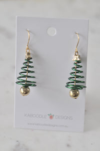 Pair of green spiral Christmas tree drop earrings with gold star and bauble on Kaboodle card