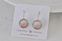 Round leverback earrings on Kaboodle Designs card, showing pink, mint and orange sunset stripe design