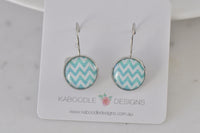 Pair of round aqua chevron leverback earrings on Kaboodle Designs card