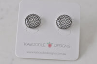Round black and white chevron stud earrings on Kaboodle Designs card