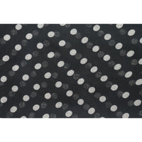 Close-up flat view of black viscose fabric with white and grey polka dot pattern