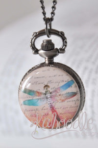 Dragonfly pocket watch necklace with vintage script design on antique bronze case