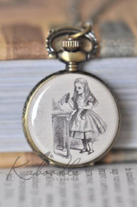 Brass pocket watch necklace with Alice in Wonderland Drink Me illustration on the cover