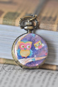 Owl friends pocket watch necklace pendant closed, showing painted owl artwork on antique bronze case