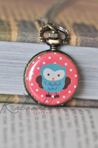 Owl pocket watch necklace with pink polka dot design and antique bronze case