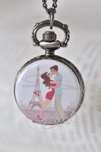 Pocket watch necklace with Paris couple illustration in front of the Eiffel Tower