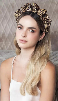 Model wearing the leopard ruffled statement headband with hair worn down