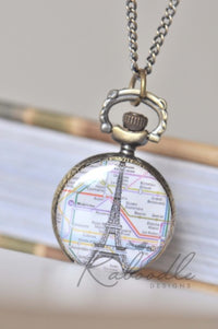 Closed pocket watch necklace with Paris map and Eiffel Tower design on chain
