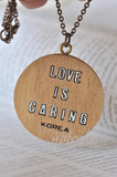 Wooden Moppet Retro Pendant Necklace - Love is Caring - Rare Find