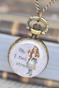 Bronze pocket watch necklace with Alice in Wonderland illustration reading Oh, I feel strange